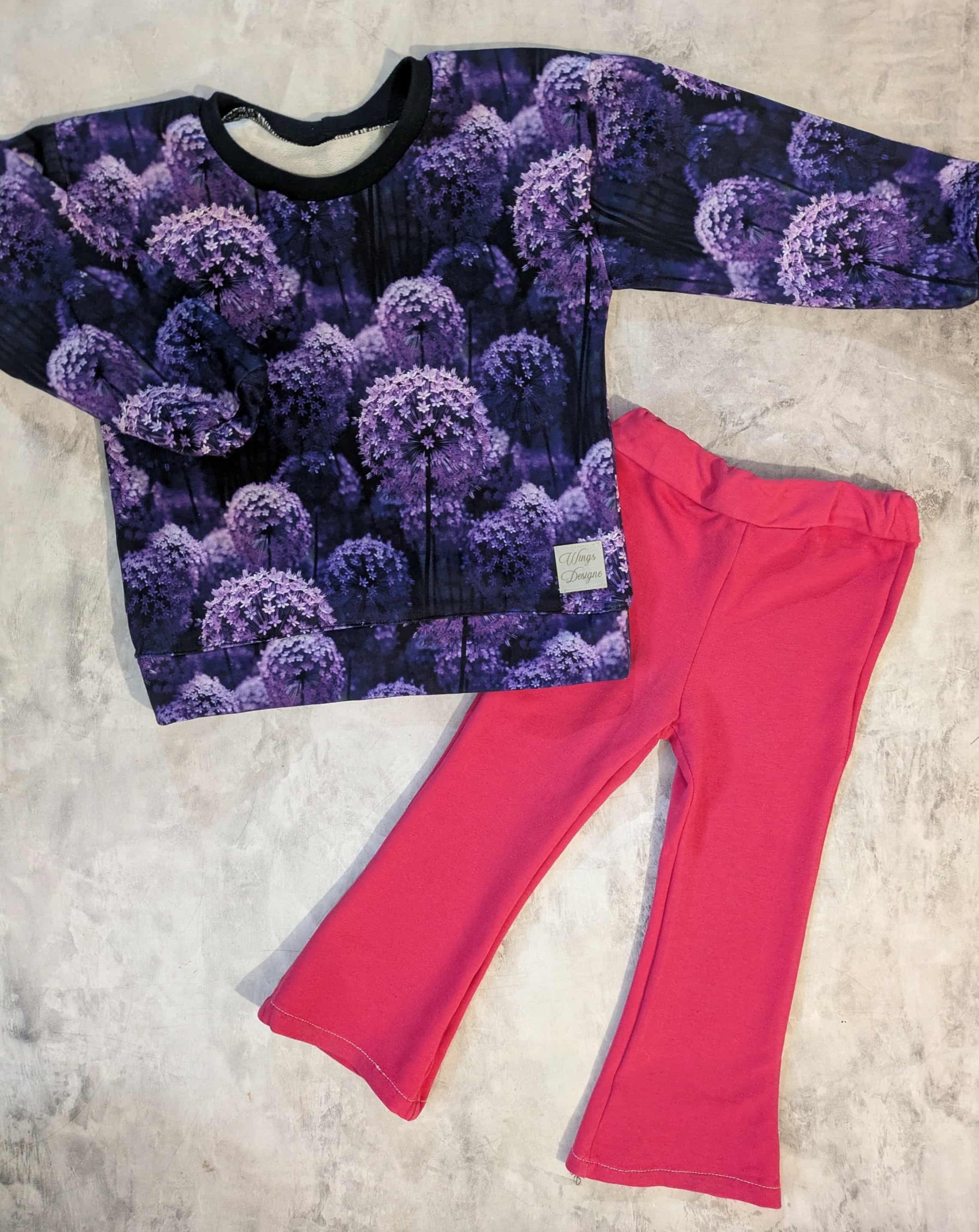 Dres Allium z różowymi spodniami